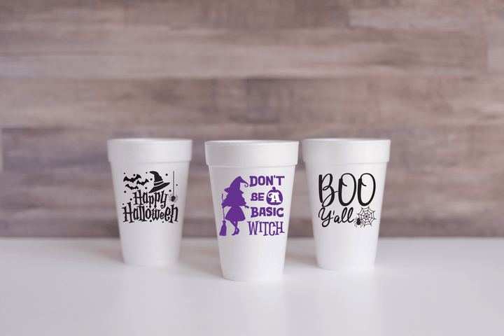 Three, seasonal Halloween foam cups. Happy Halloween, Don't be a Basic Witch, and Boo Y'all designs.